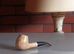 An olive pipe (purposefully made of olive wood)