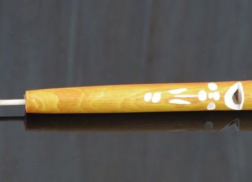 Wooden pipe with a whistle 