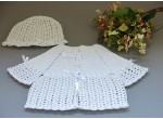 A set for a girl - a sweater - cape and hat